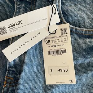 Zara wide leg high- waisted jeans. Split hem. Size 6. New with tags